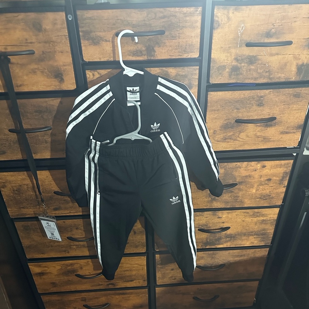 Adidas Black Tracksuit with White Stripes